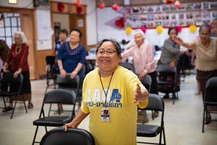 An older woman in an exercise class at Lao Advancement in Minneapolis, MN.