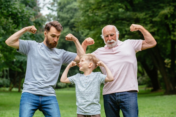 Three generations of men being silly