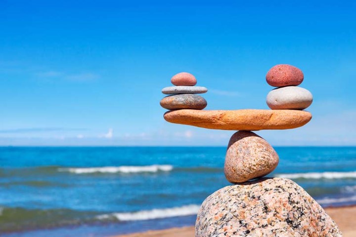 Stones balanced on a larger rock