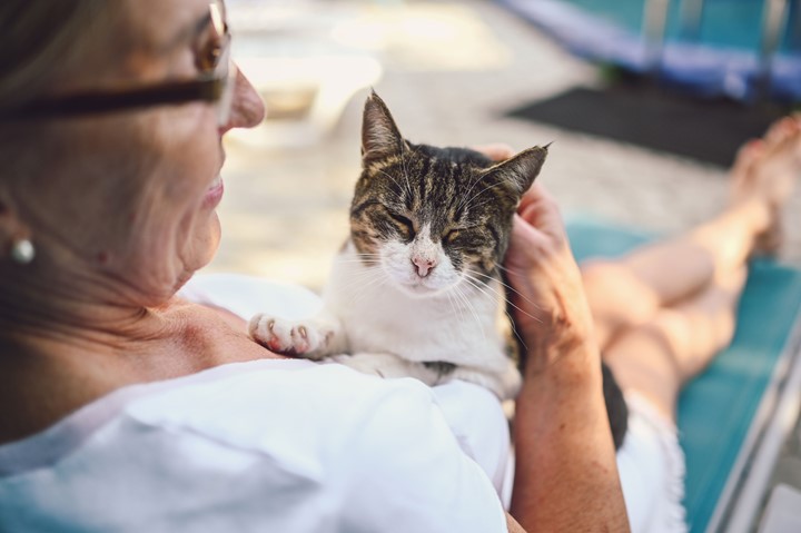 Older woman with a cat