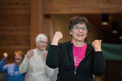 Older woman in an exercise class