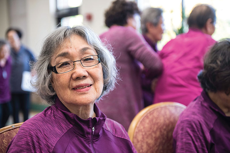 Participants in a Juniper class, smiling woman