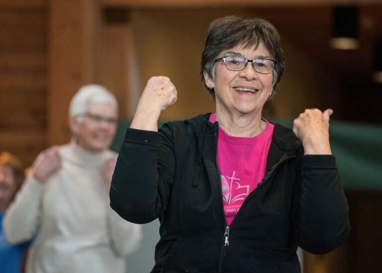 Photo of an older woman exercising.
